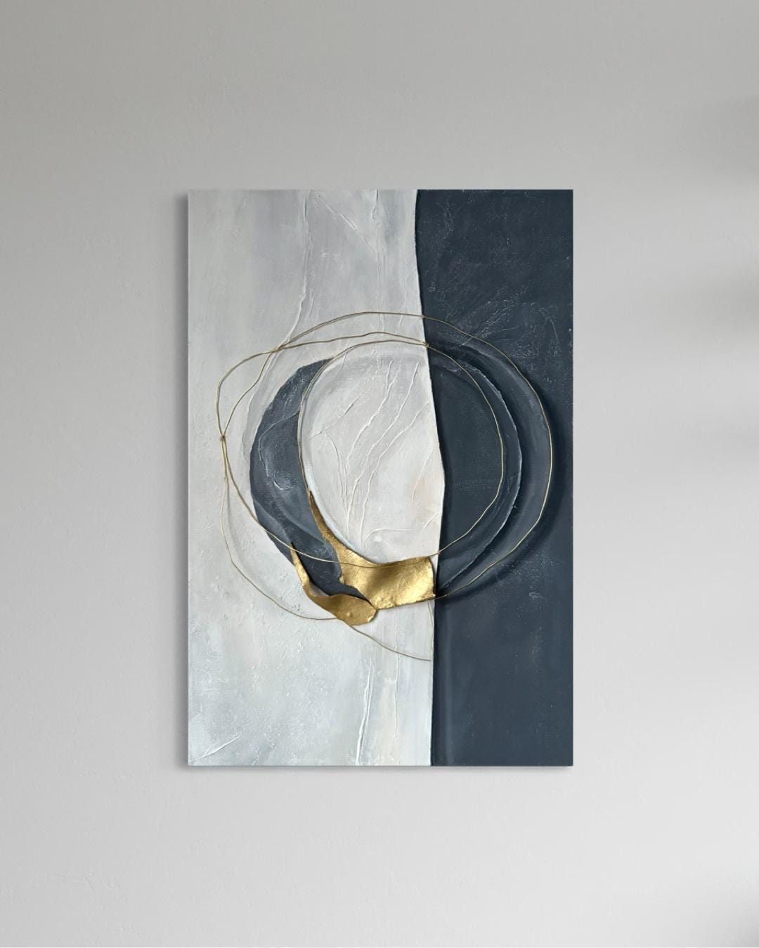 círculo, Made to order, any size — A canvas split into black and white, with a gold circle holding the two halves together.