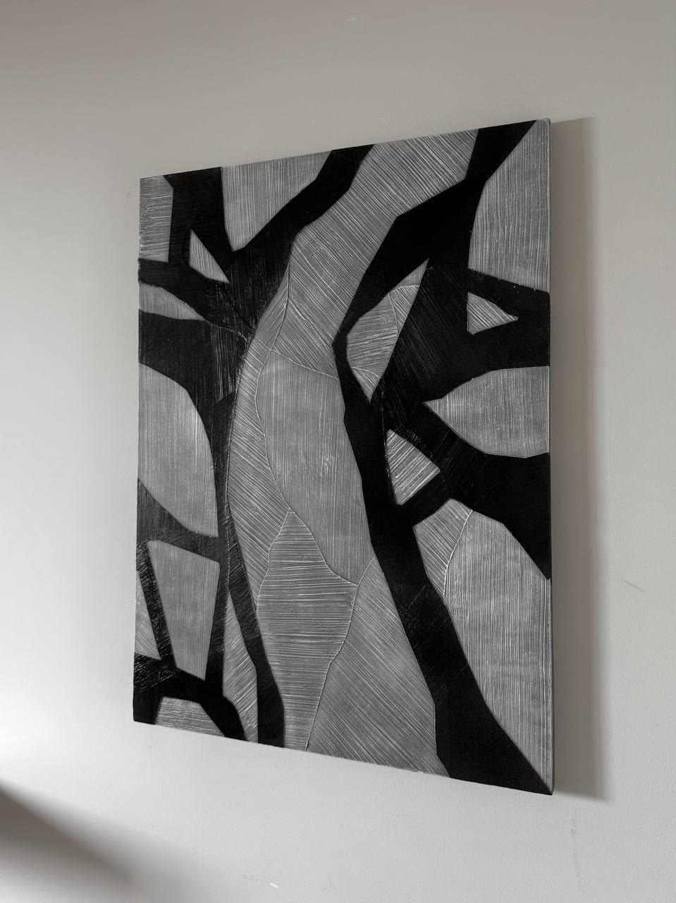 element, 60×80 cm — Bare branches across a grey field: graphic and calm at once.