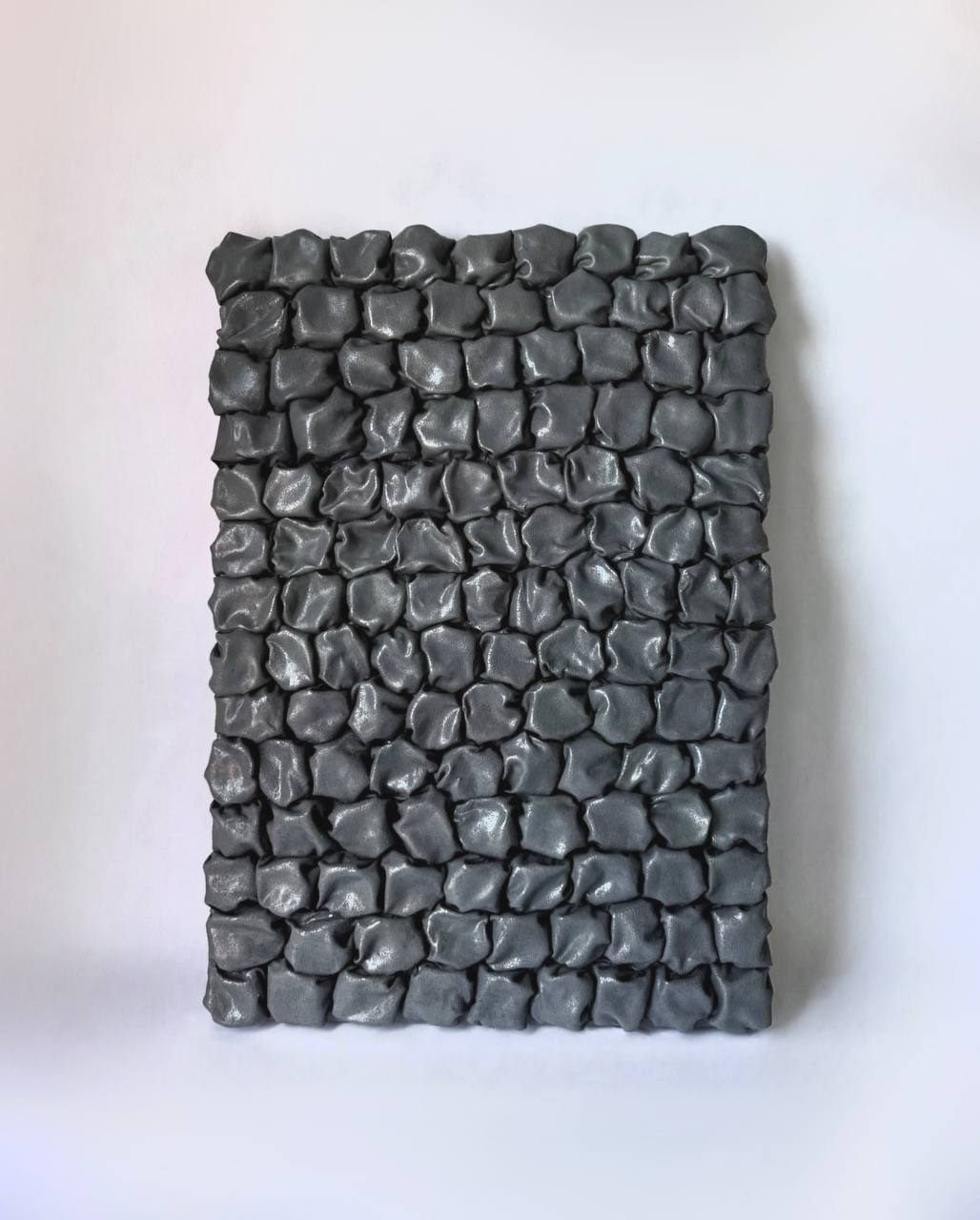 Formas oscuras, 70×100 cm — Polymer clay on a solid wooden base.