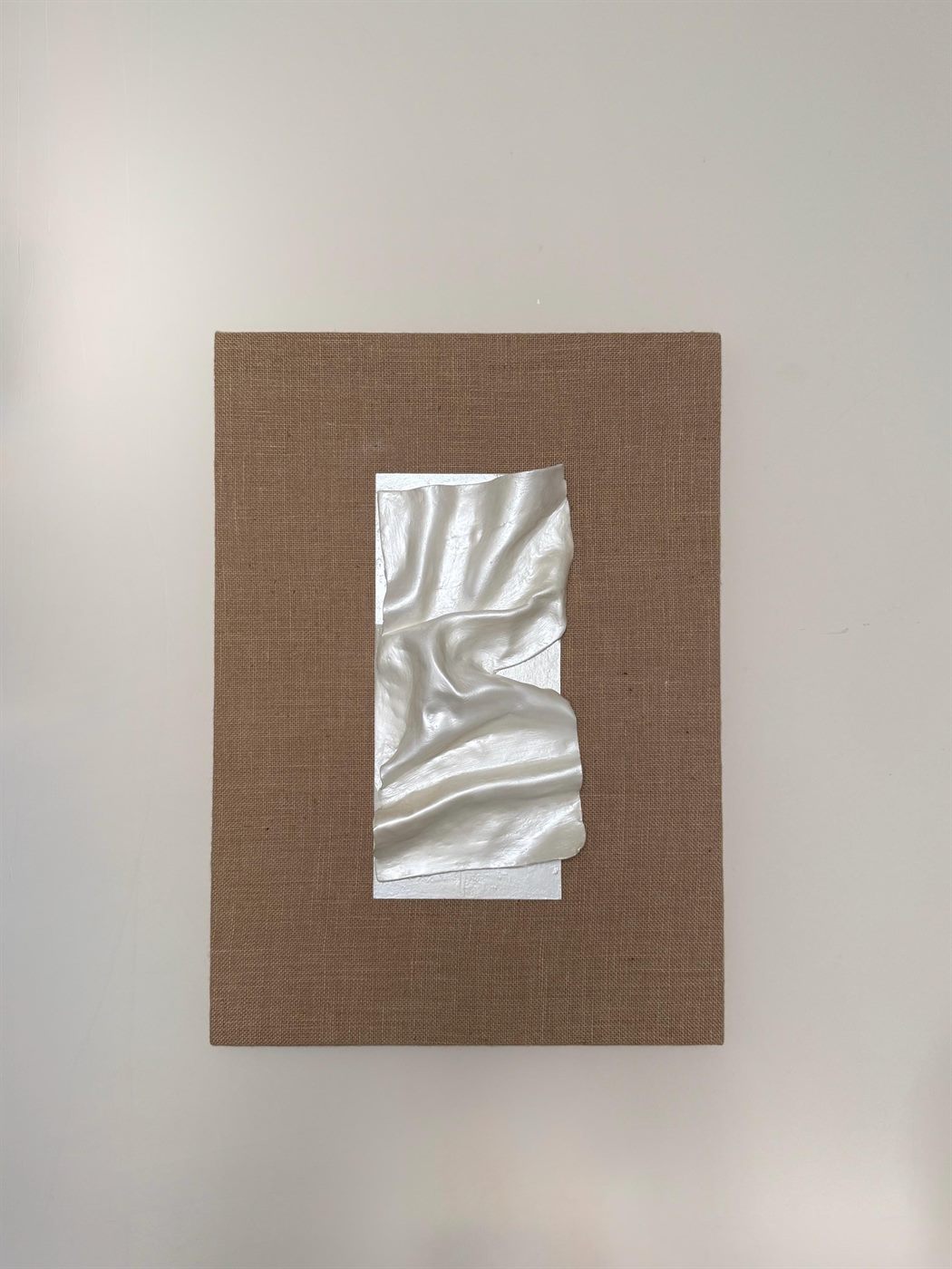 lino, Made to order, any size — A single clay fold on natural linen over a solid wooden base.