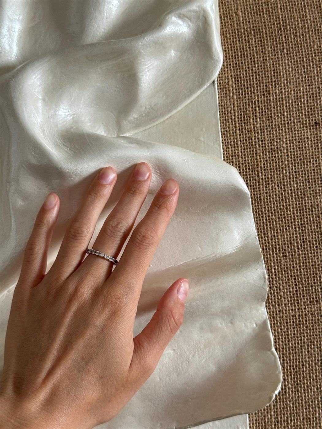 lino, Made to order, any size — A single clay fold on natural linen over a solid wooden base.