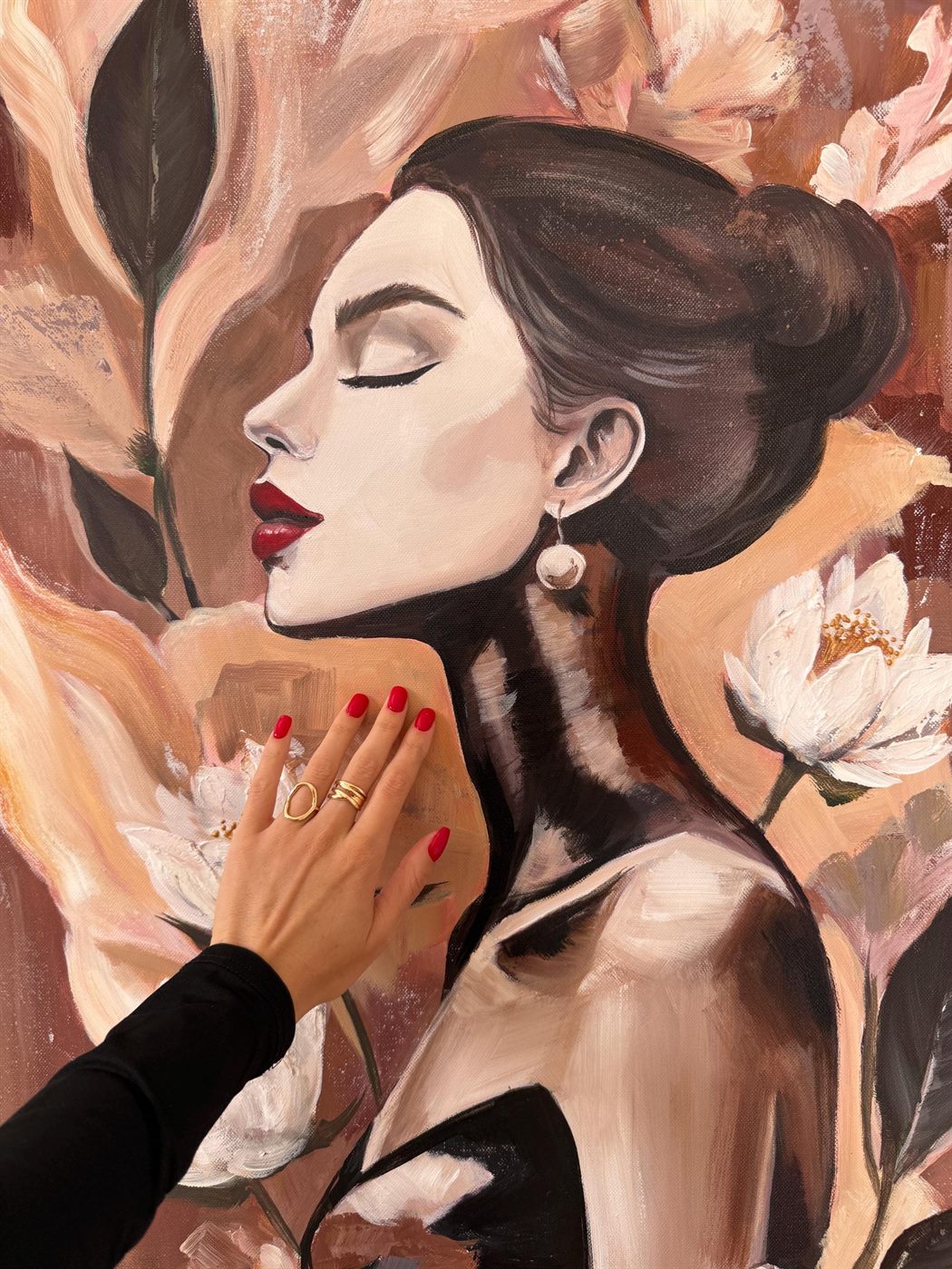 mirada, 60×80 cm — A woman in profile among magnolias, warm terracotta and rose over a dark ground.