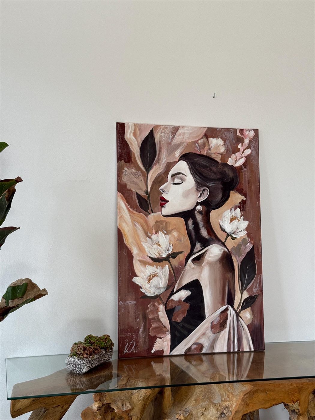 mirada, 60×80 cm — A woman in profile among magnolias, warm terracotta and rose over a dark ground.
